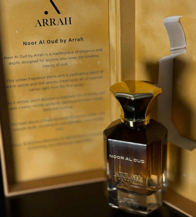 ARRAH Noor Al Oud perfume bottle with packaging in the background